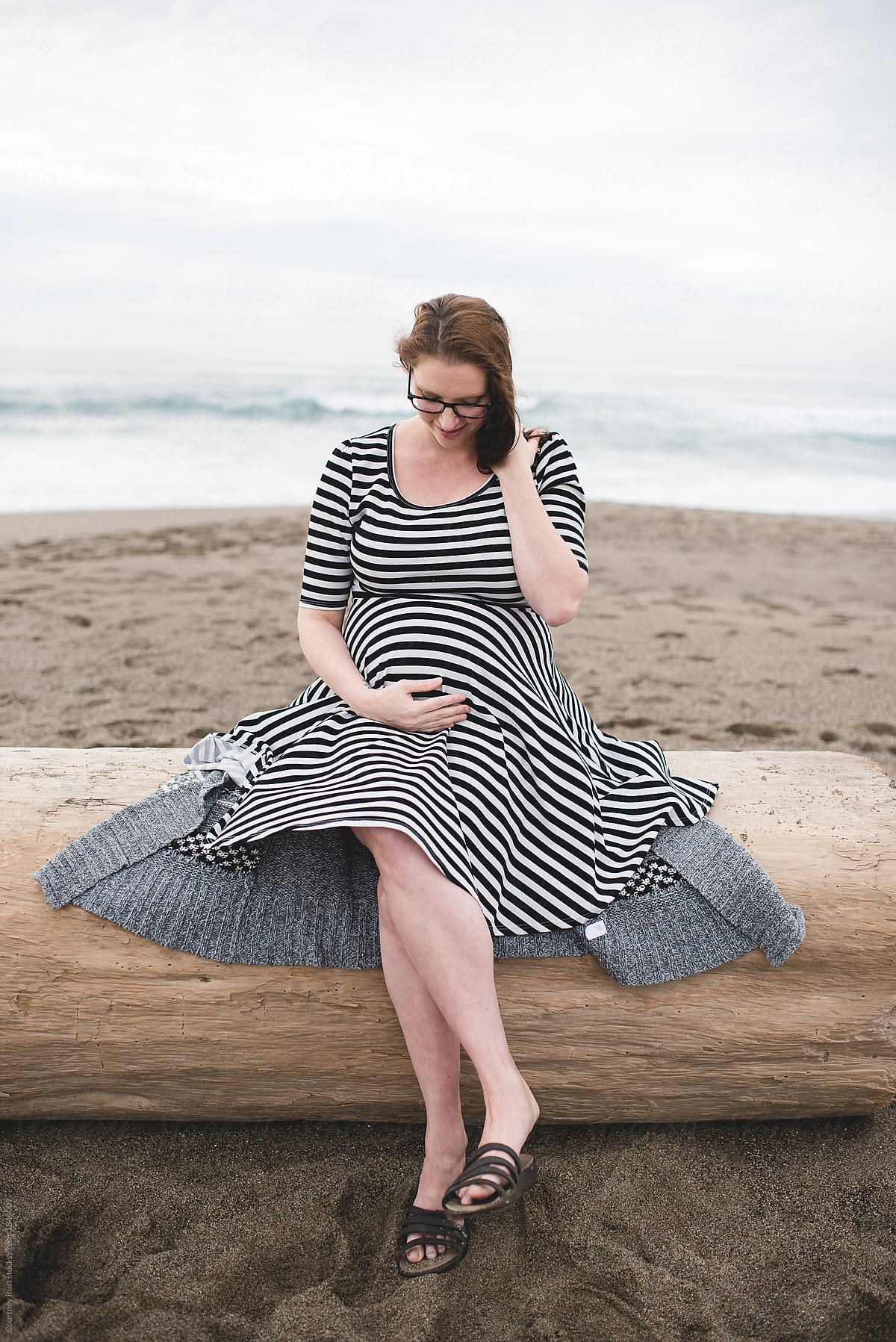 Portrait of a pregnant woman on the beach by Courtney Rust - Maternity