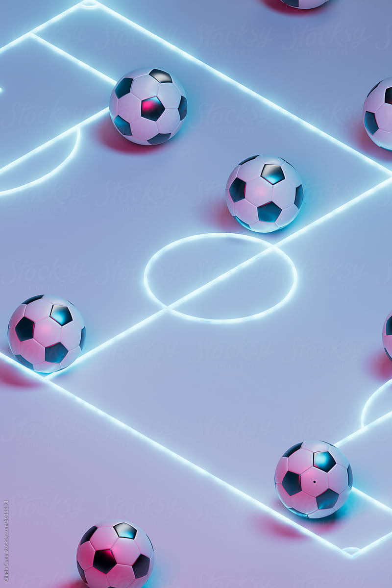 various balls in a soccer field