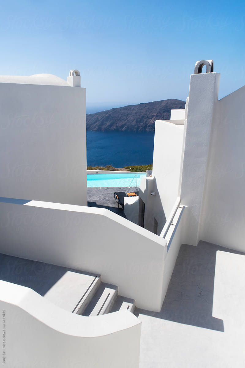 santorini white architecture, sea, swimming pool and blue sky