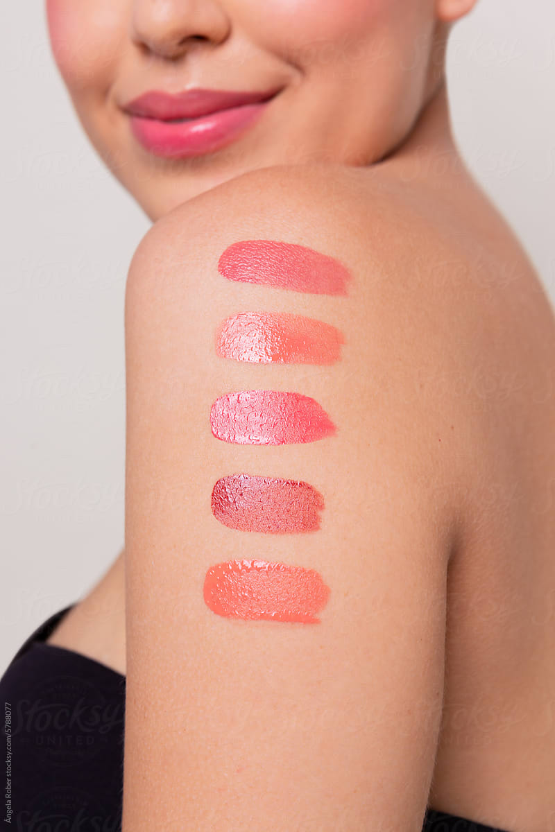 Profile View with Swatches of Lipstick Shades on a woman's arm