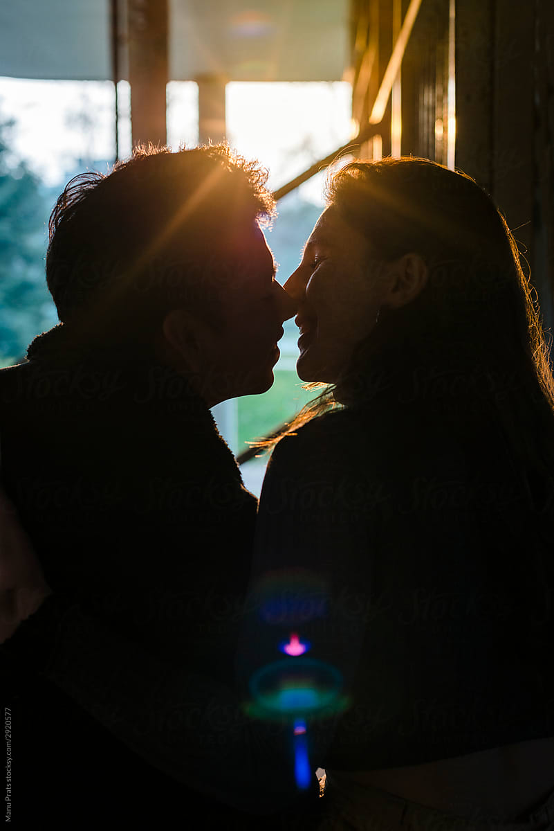 Multiracial Couple Kissing By Stocksy Contributor Manu Prats Stocksy 