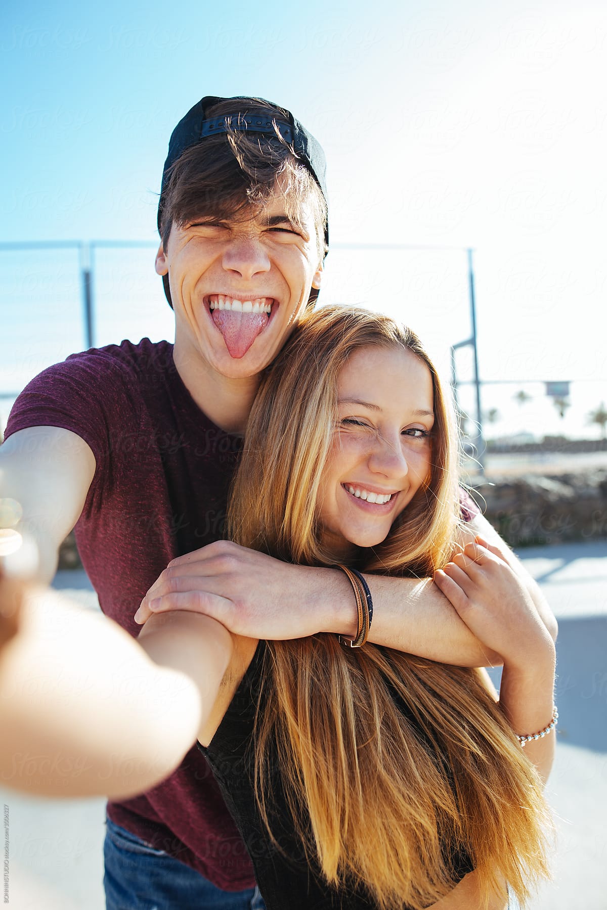 Funny Teenage Couple Making A Selfie In Summer.