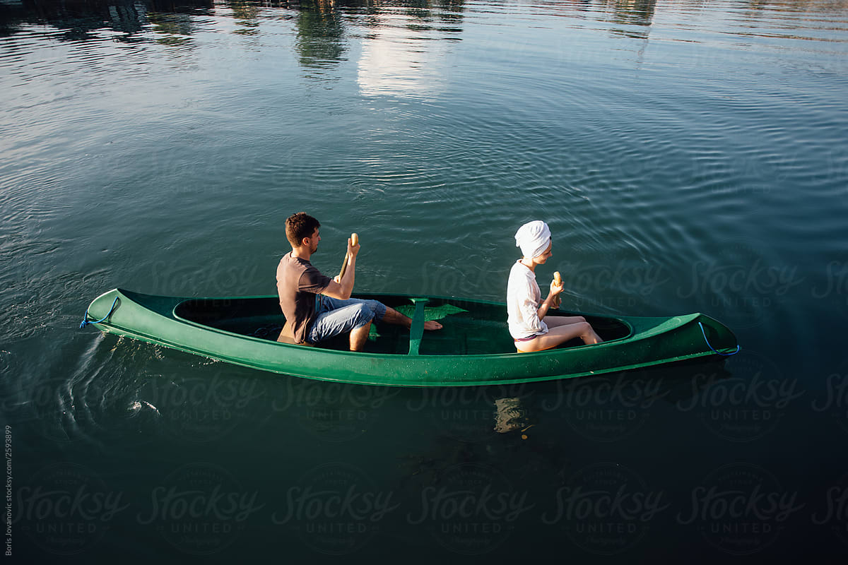 Couple canoeing on the lake