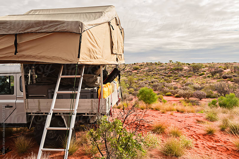 four wheel driver with rooftop camper in Outback Australia