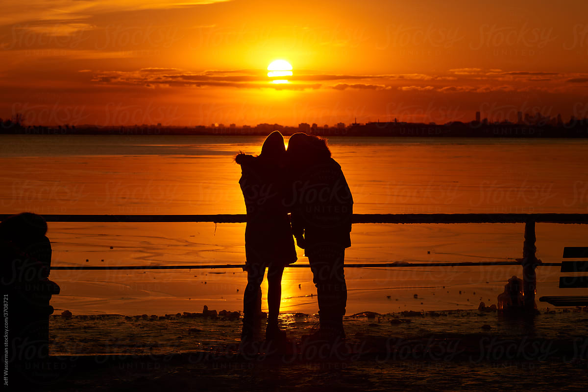 Couple Watching Sunset in Winter