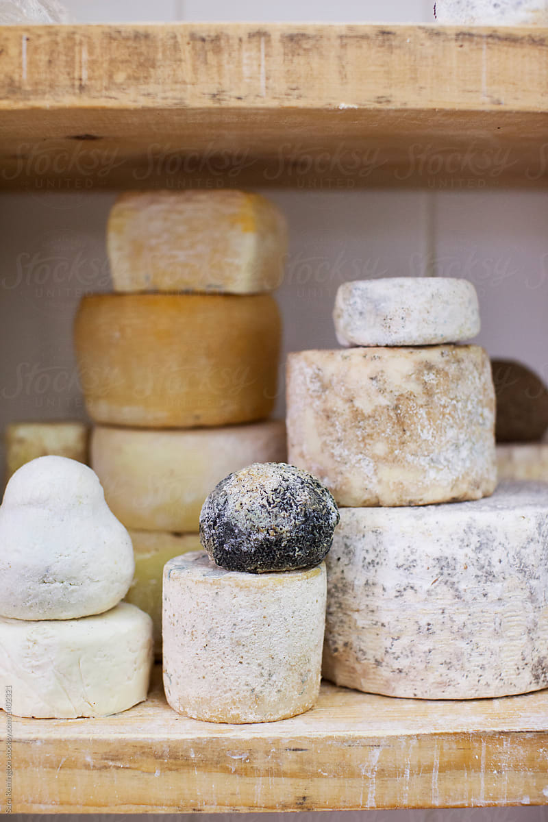 Various Goat Cheeses In Cheese Shop In Sicily