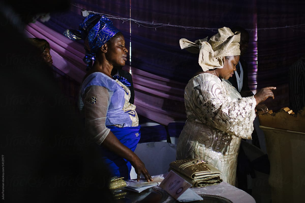 African women praying.