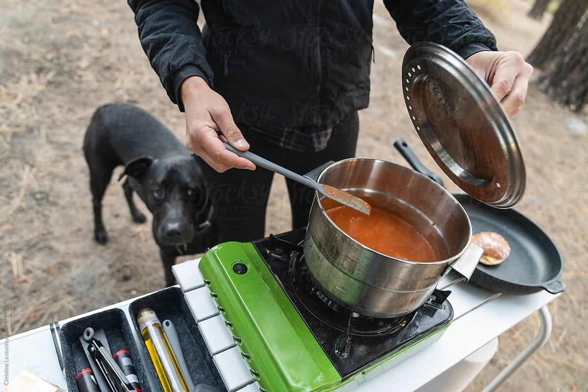 Camp cooking with dog