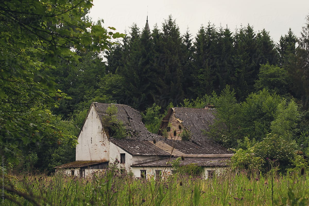Abandoned farm with collapsed roof
