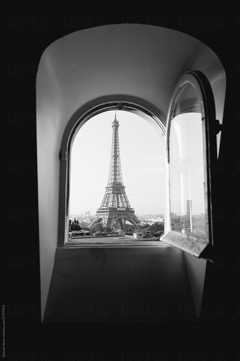 View of the Eiffel Tower through a window