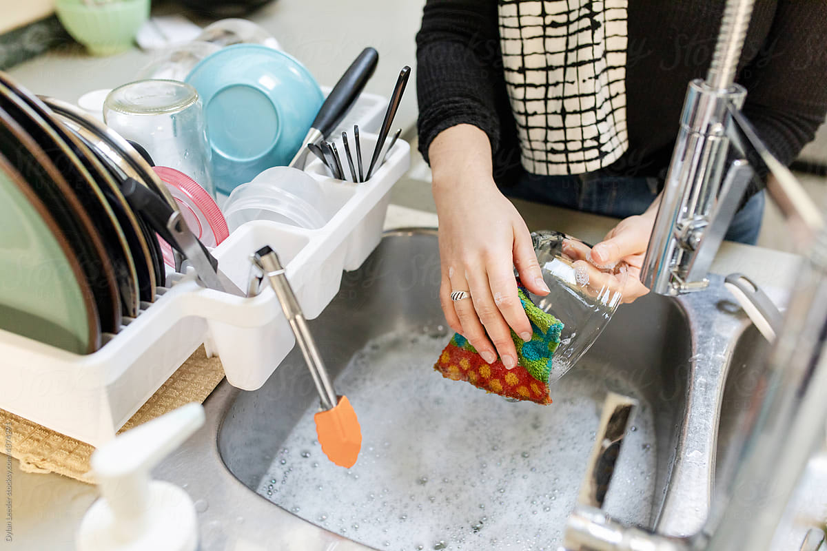 Female Hands Doing Dishes