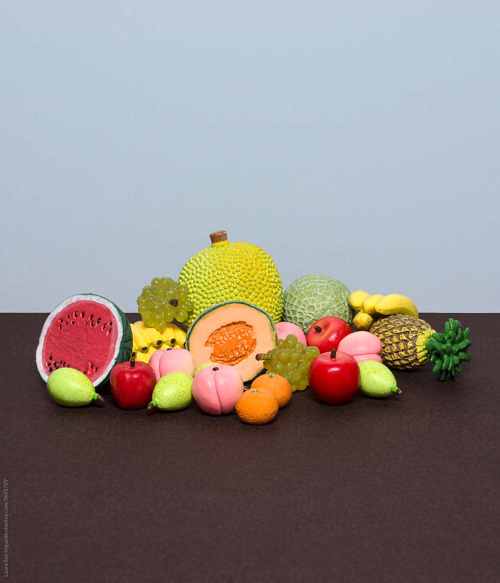 Still life with a display of miniature plastic fruits