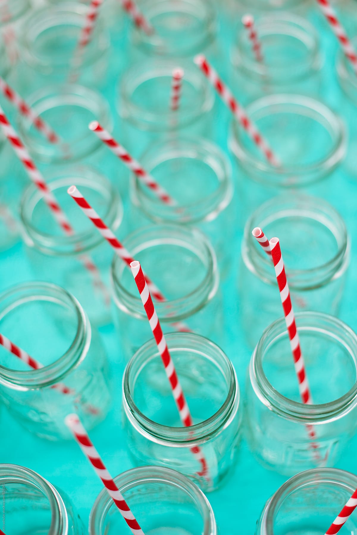 colorful straws in mason jars