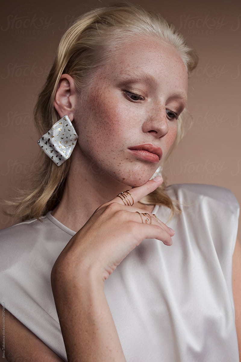 Young model wearing earrings
