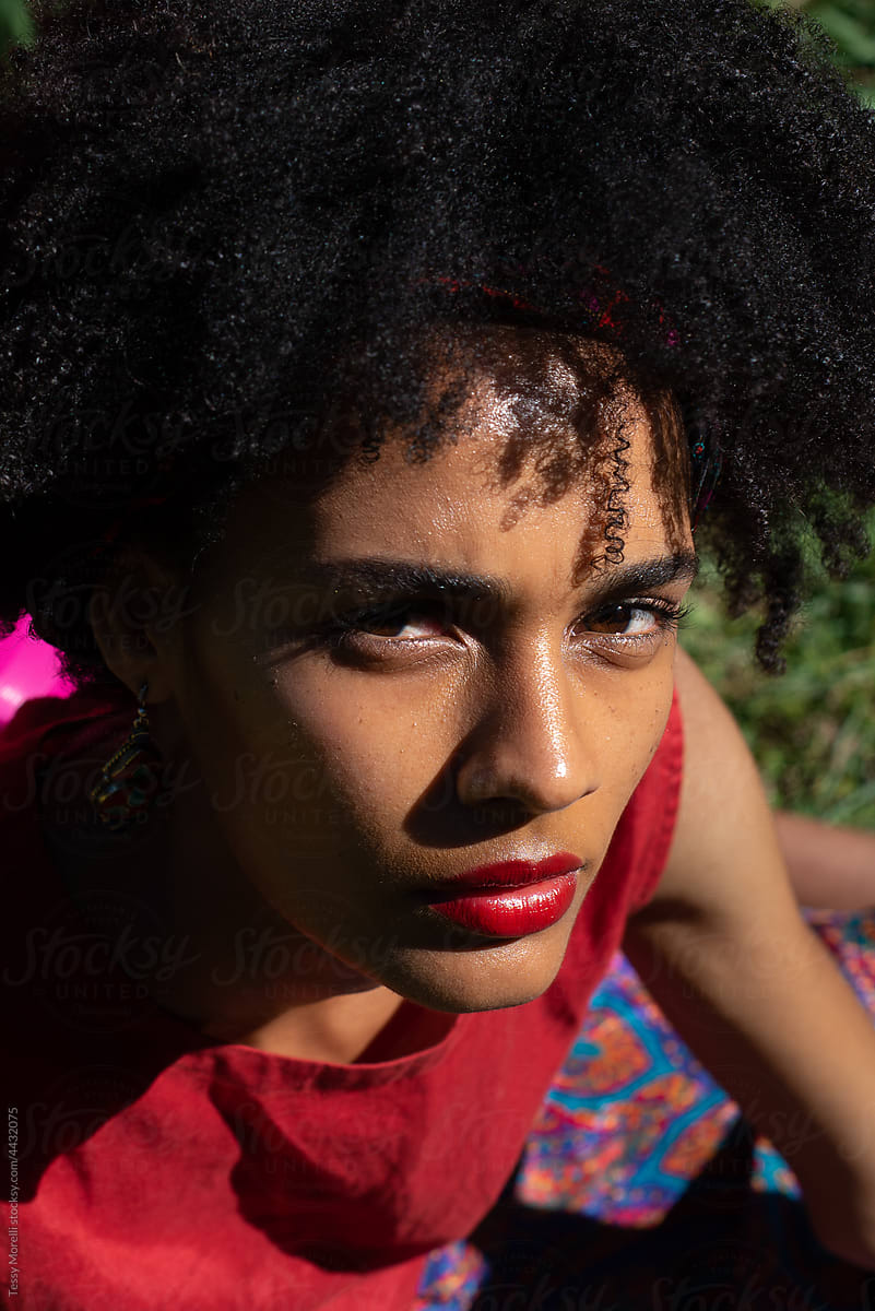 Angry afro black woman portrait close up