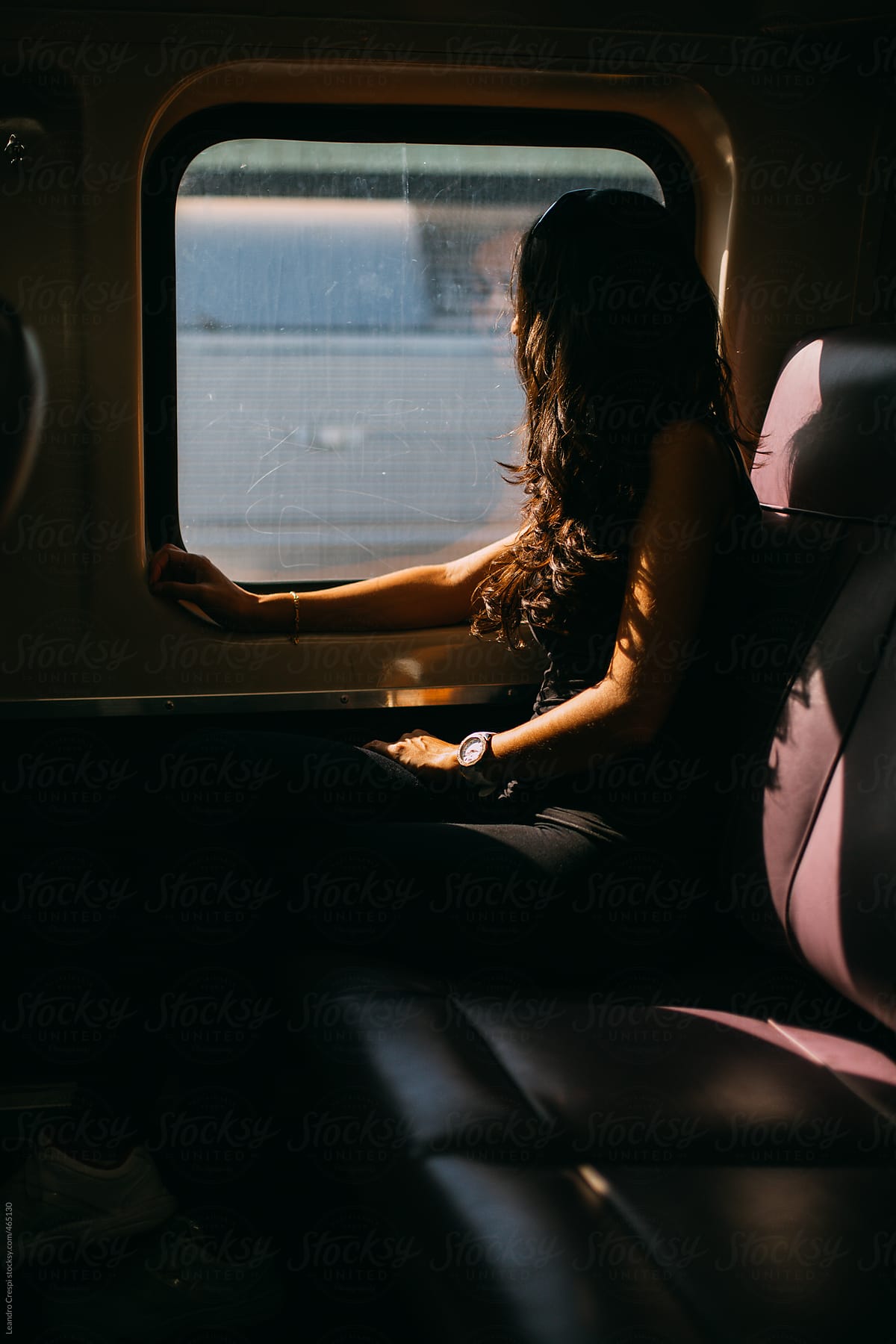 Woman on a train trip