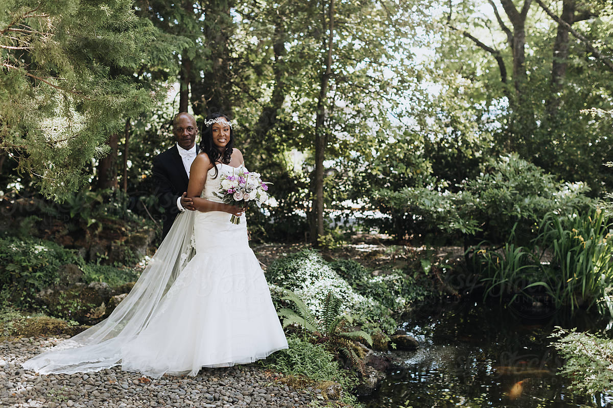 Portrait of Bride and Groom in Romantic Forest