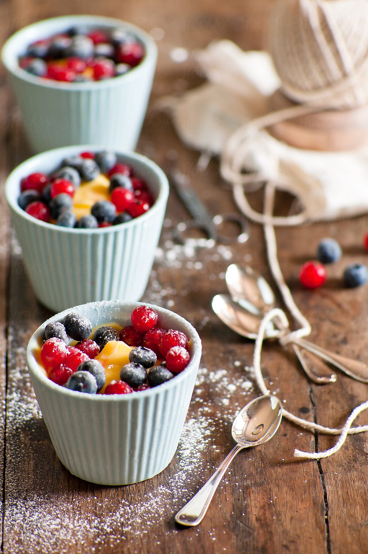 custard with currants and blueberries