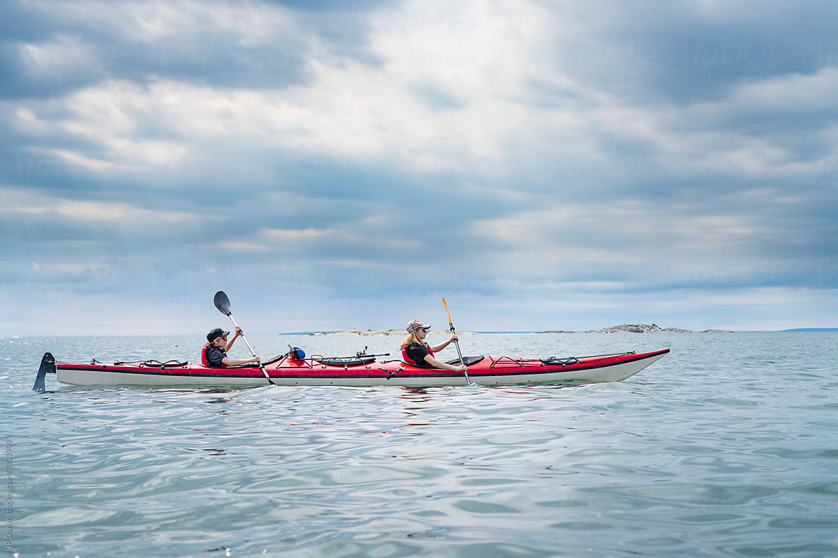 Teens Paddling Tandem Sea Kayak Freshwater Lake Georgian Bay Killarney Ontario Canada