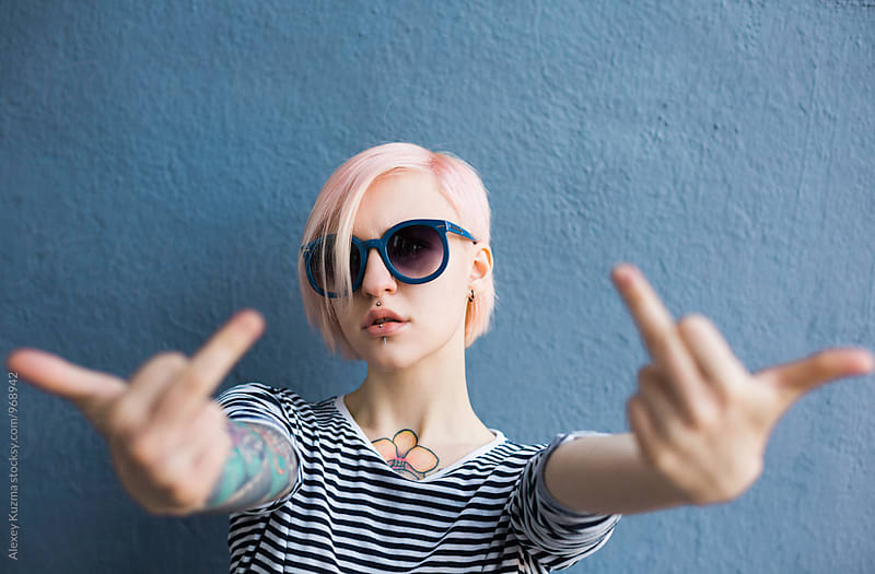 cool woman showing middle fingers