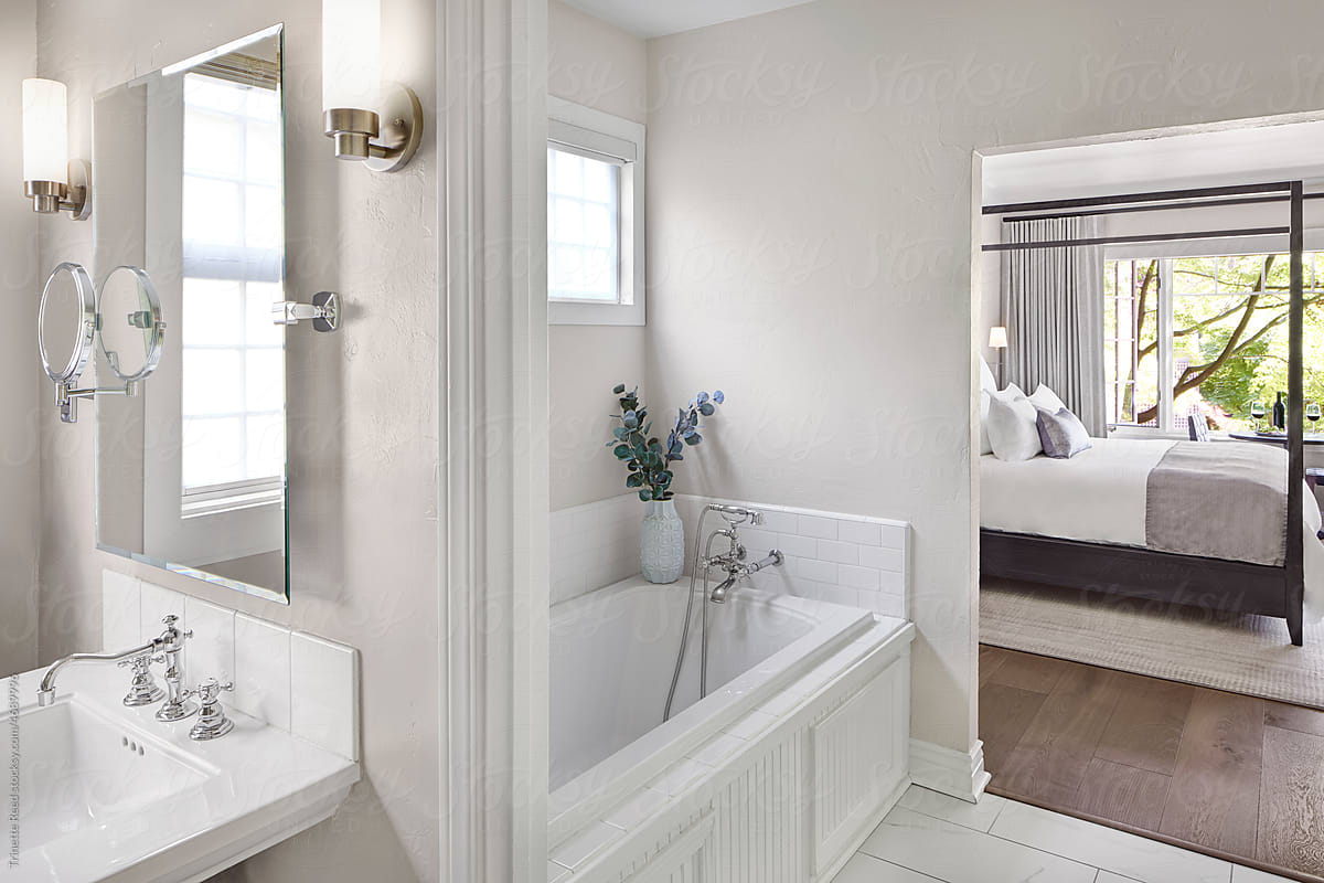 Luxury hotel room and bathroom with bathtub