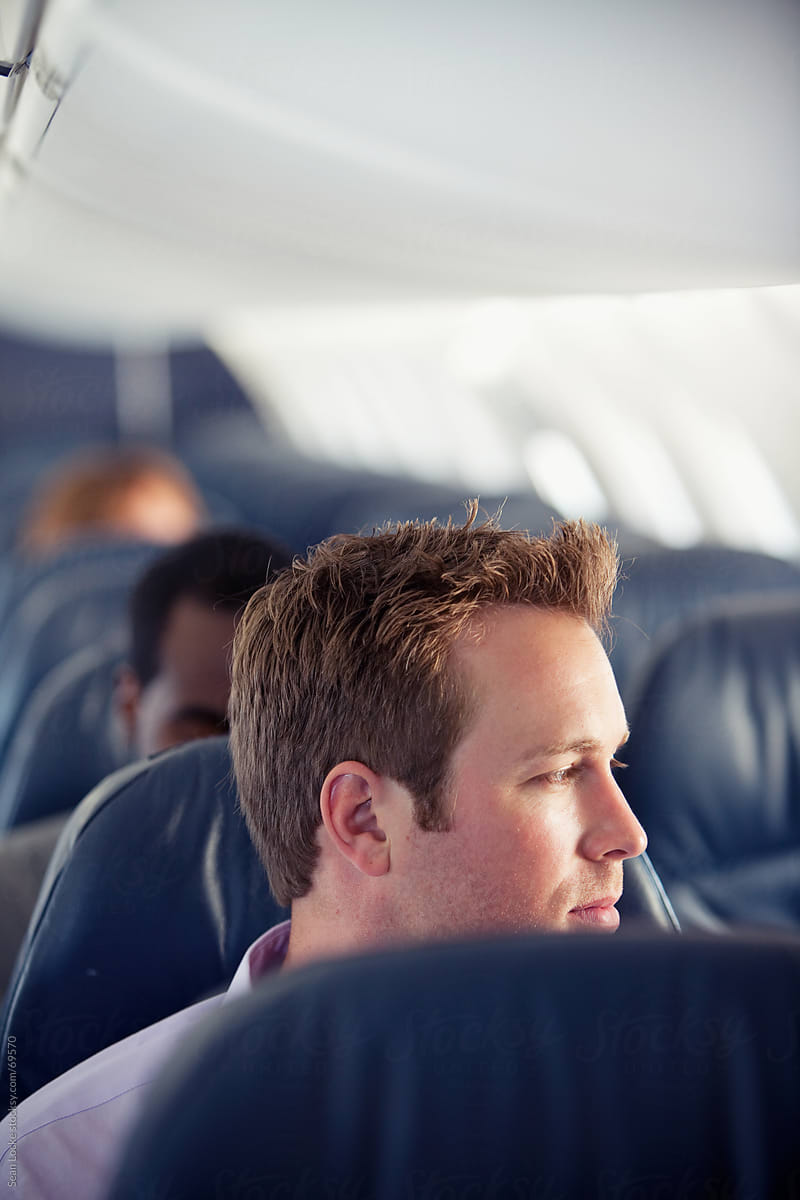 Airplane: Man Gazes Out Window
