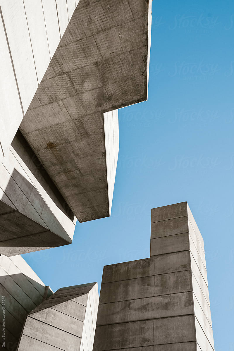 Minimal concrete geometrical architectural structures against blue sky