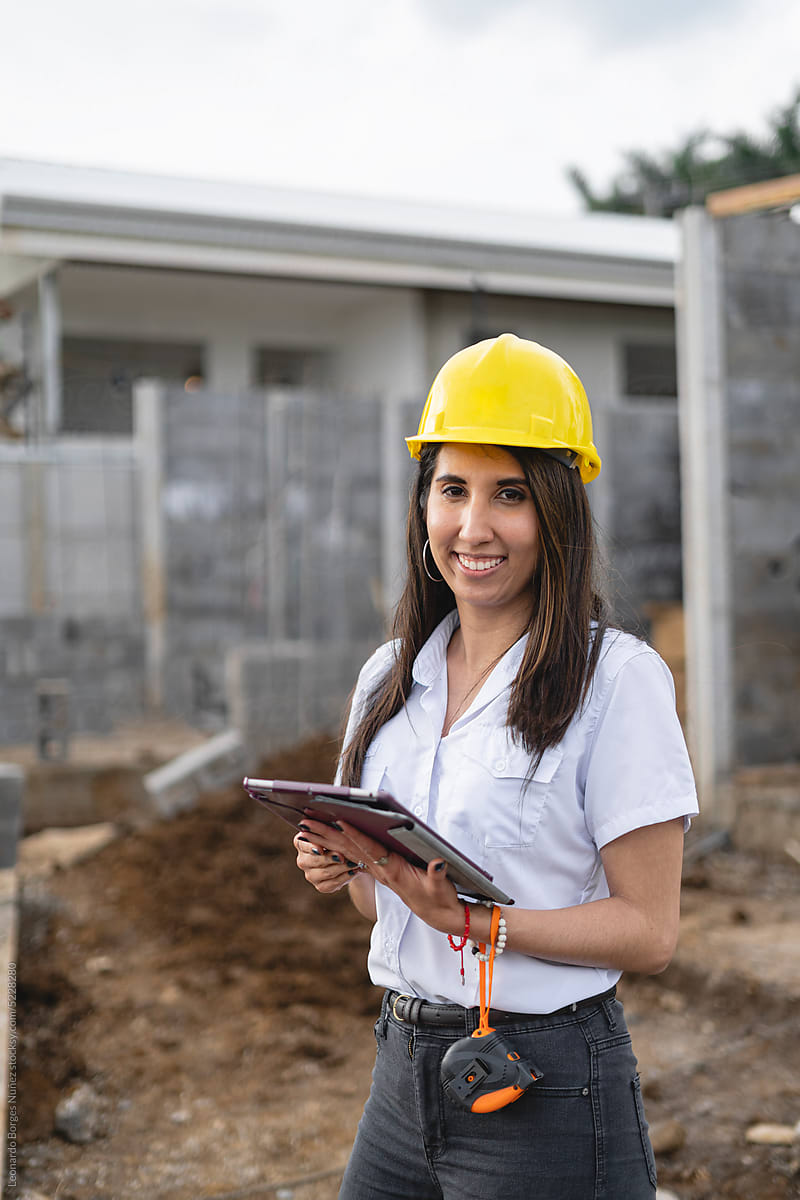 Portrait of a woman in a construction site