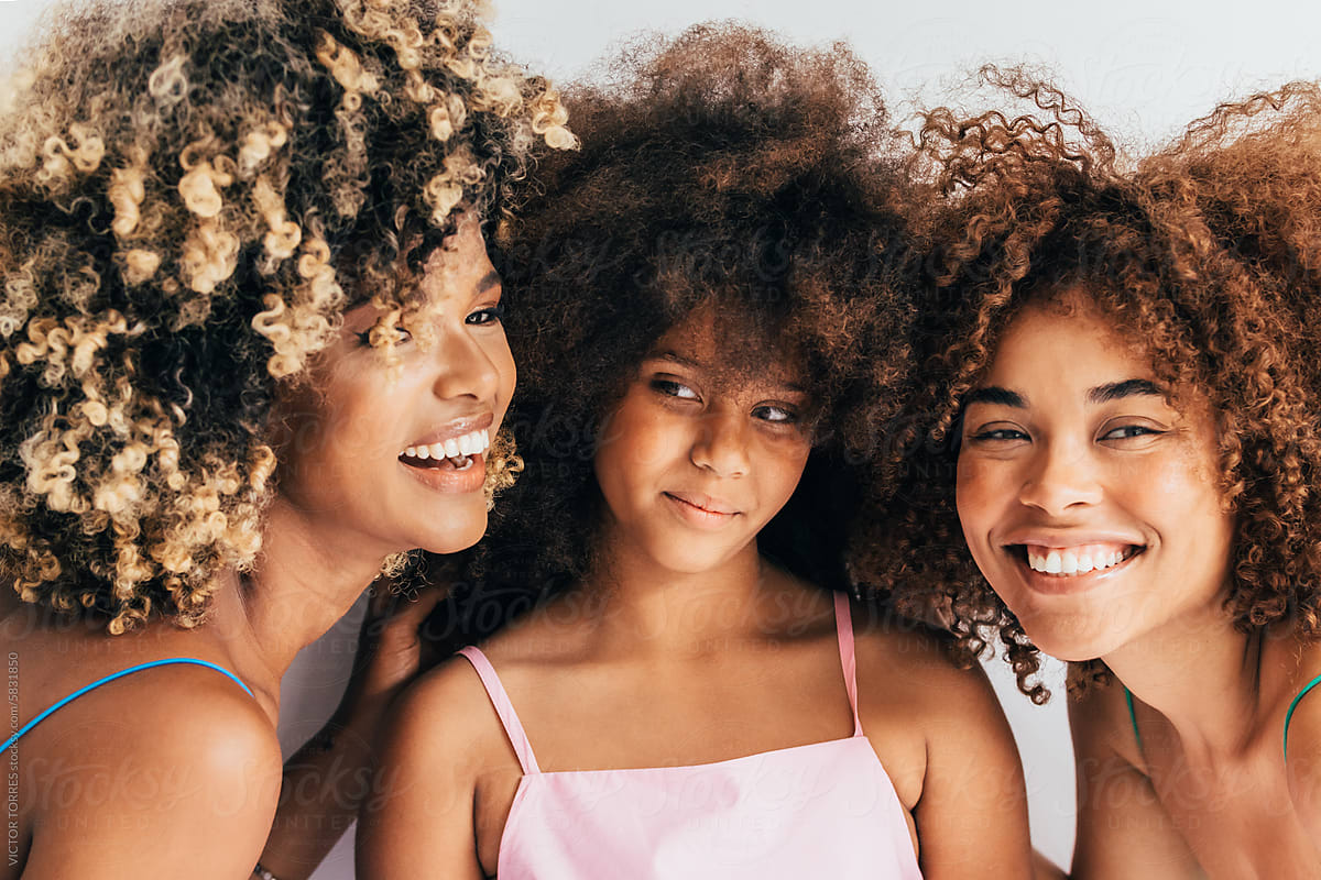 Joyful family moments with beautiful curly afro hair