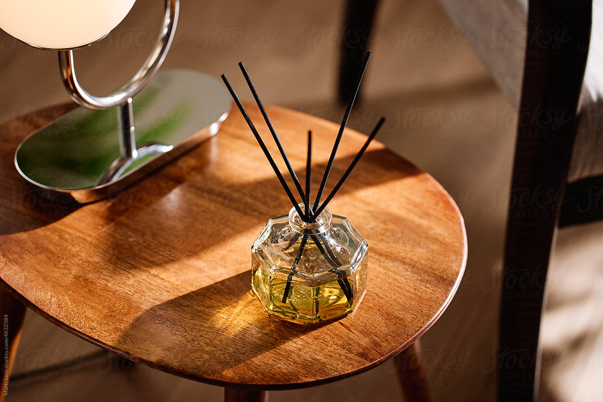 Reed diffusers on table in morning