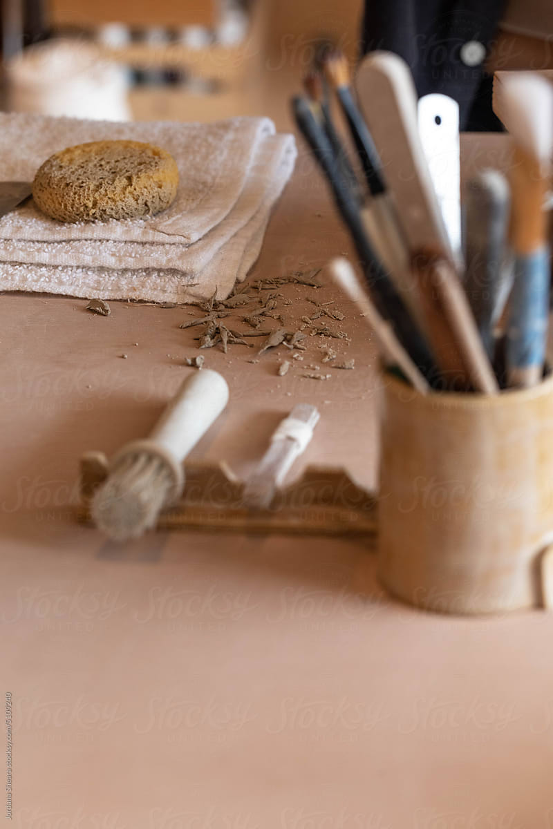 Craft tools on the table of a ceramics studio