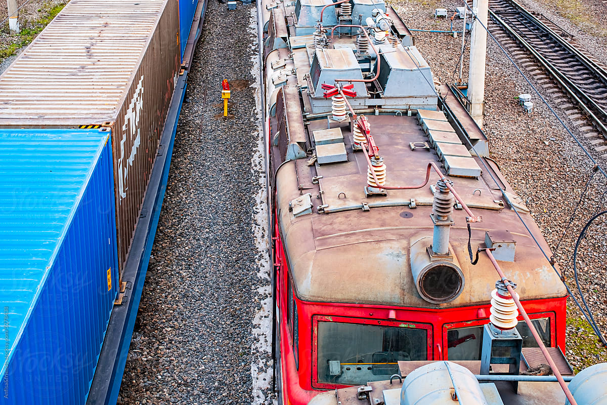 locomotive and cargo on railroad tracks