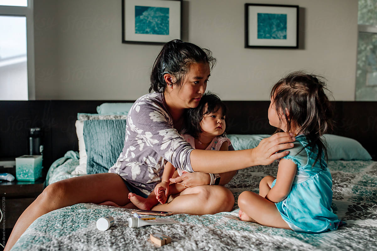 Deaf mom caring for sick daughters