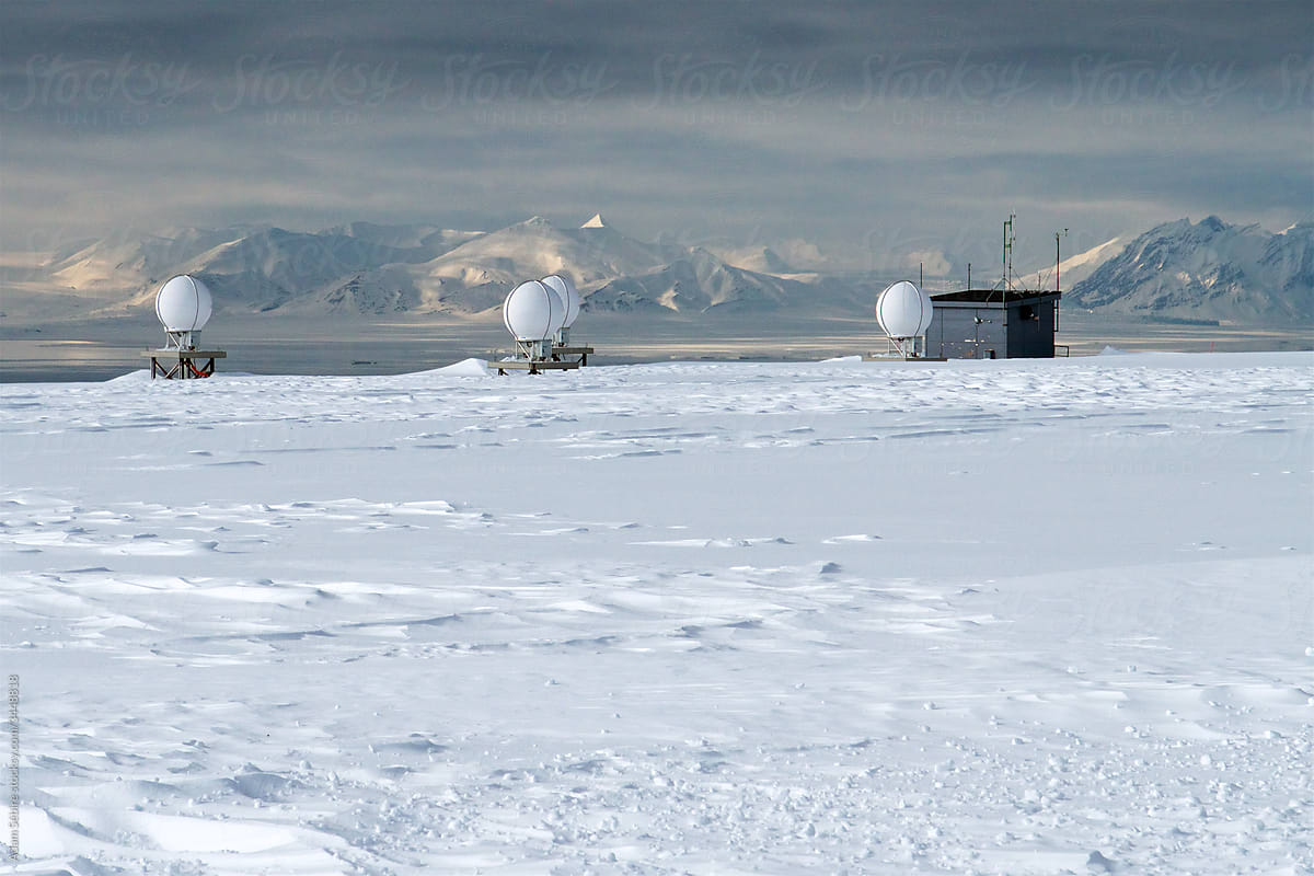 Svalbard satellite base station near North Pole, dome structures in alien snowy wasteland