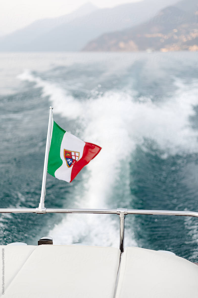 Italian flag on  back of modern Yacht