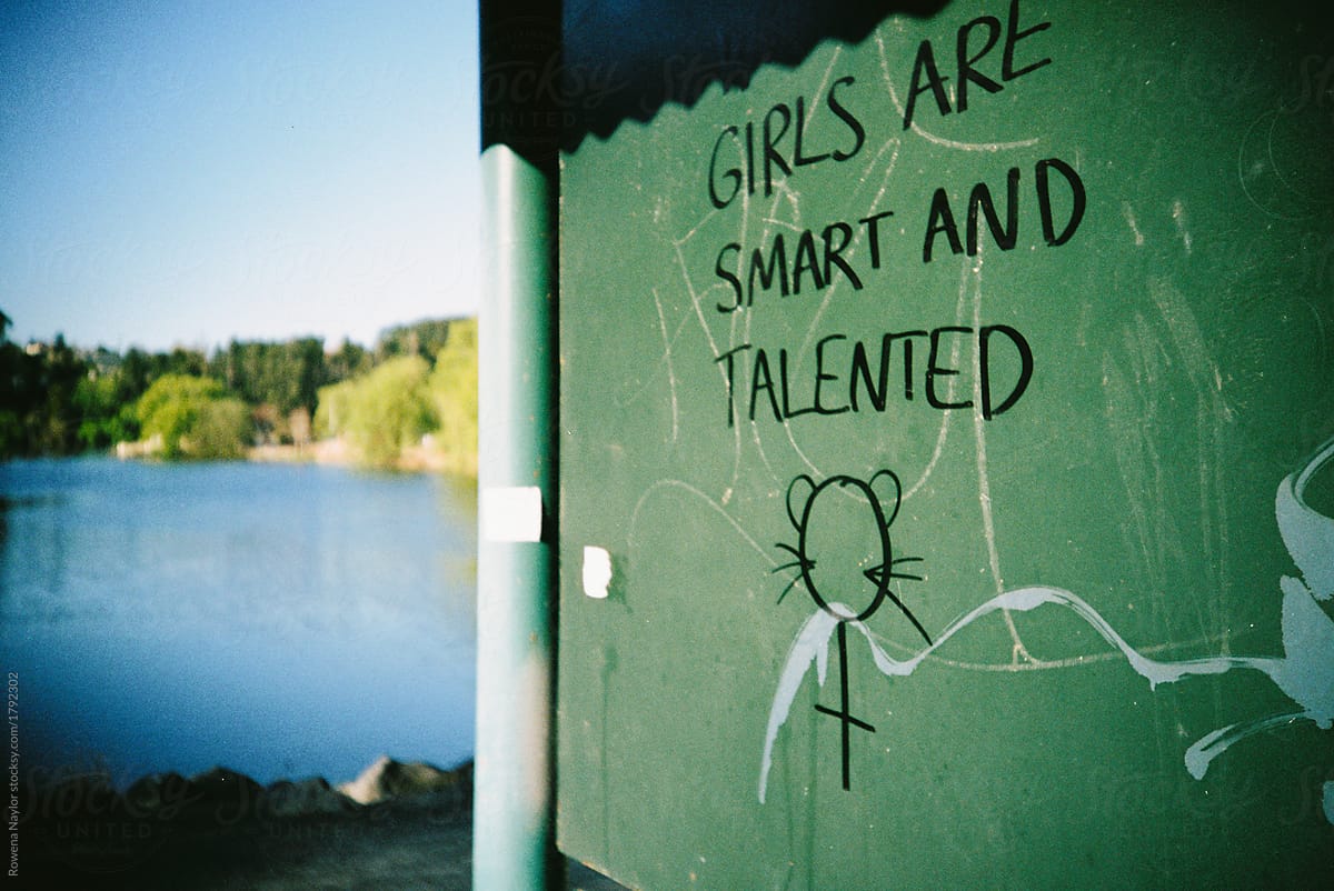 Girls are smart and talented graffitied on wall