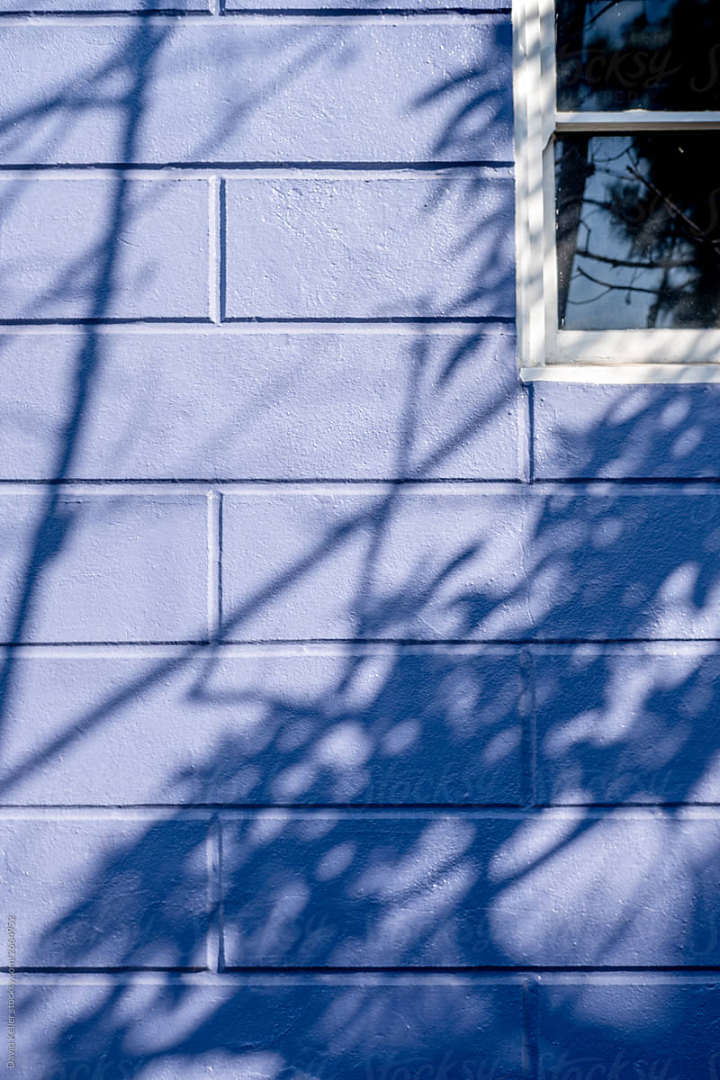 Shadow play on a purple building