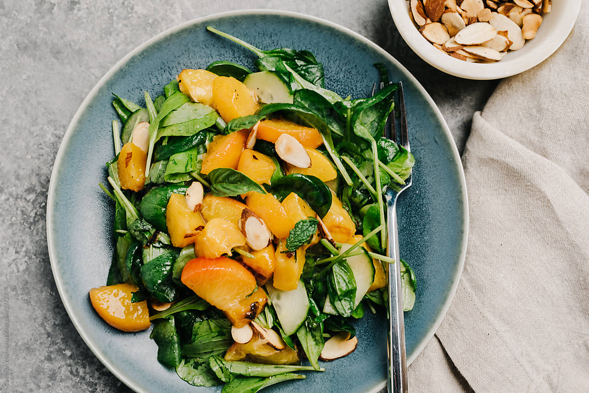 Grilled peach and toasted almond salad