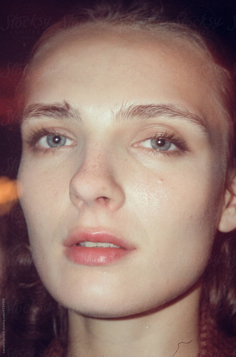 Close-up portrait of a young woman during a party