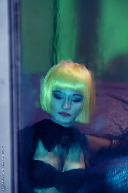 portrait of a lady with a wig in a moody room