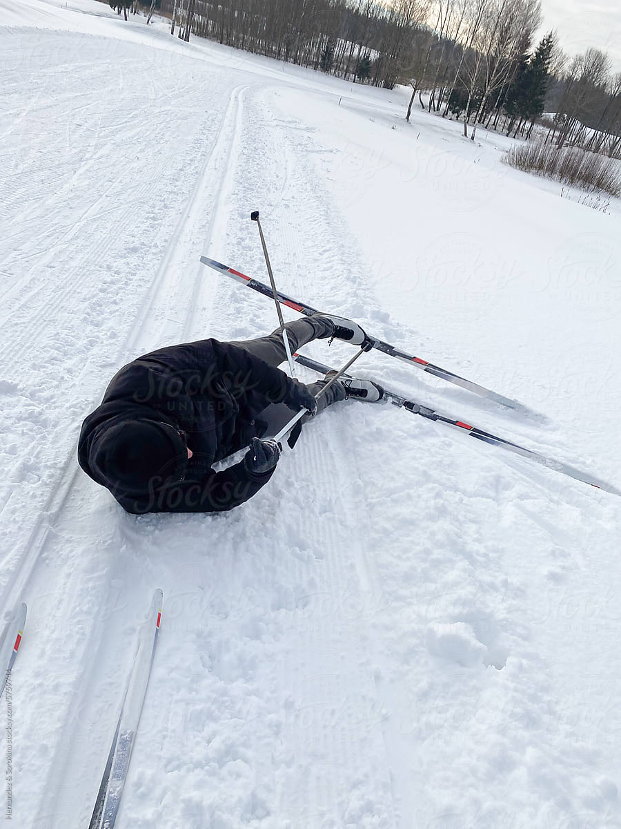 Candid Image Of Man Felt Down While Skiing
