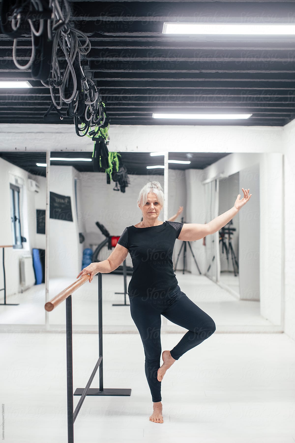 Senior Woman Doing Pilates Exercise