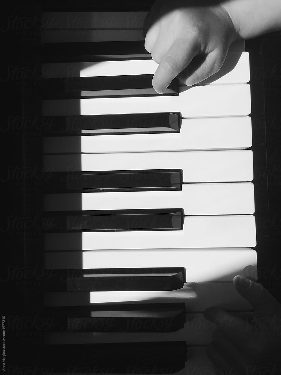 A kid playing piano