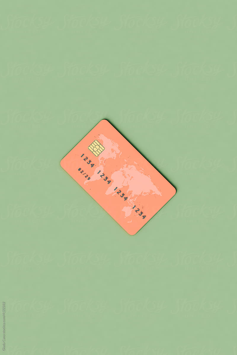a pink Credit card with a world map design