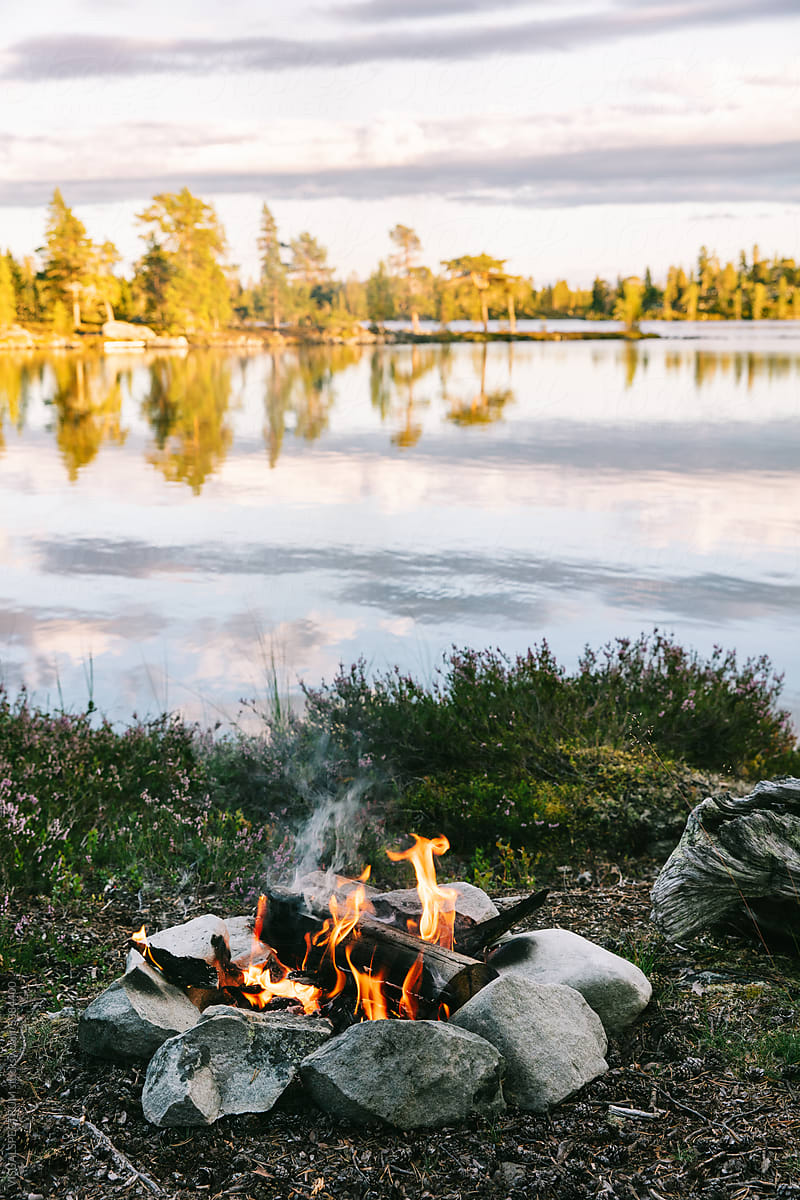 Wild Camping - Burning Campfire by Lake