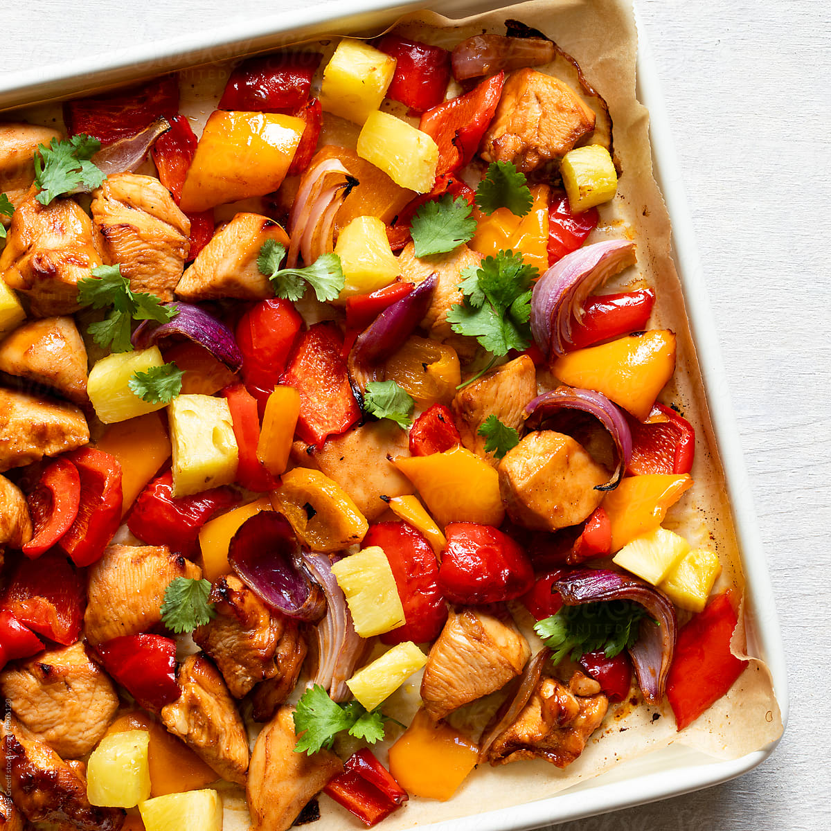 Chicken sheet pan dinner with pineapple and vegetables