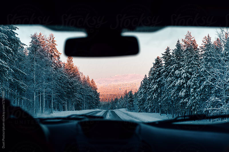 View of snowy road from car