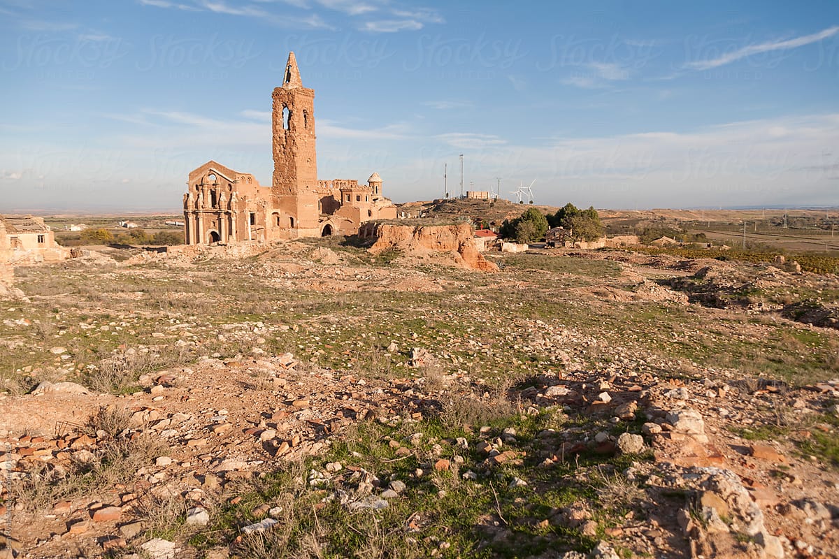 Scattered ruins of township destroyed by war surrounding ruined church