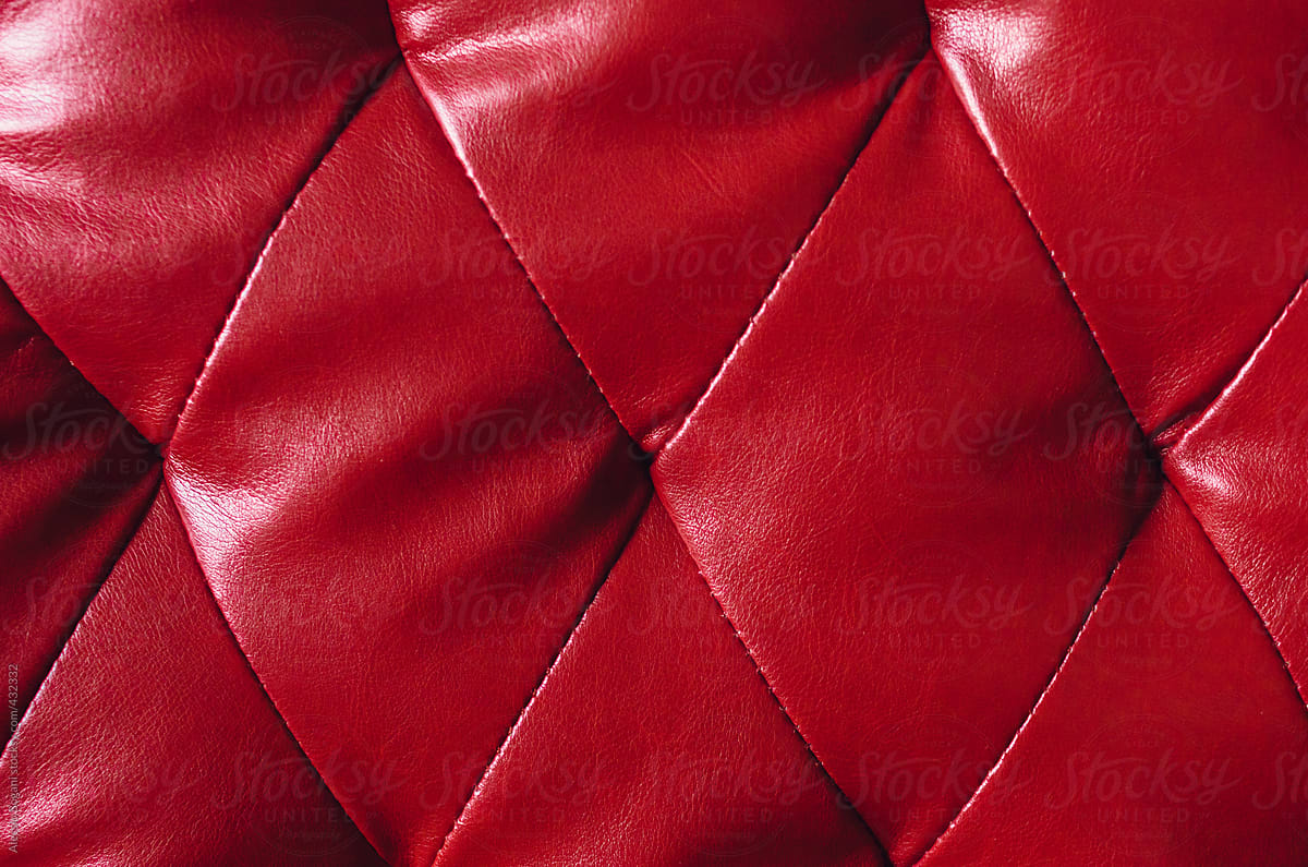 Faux red quilted leather background