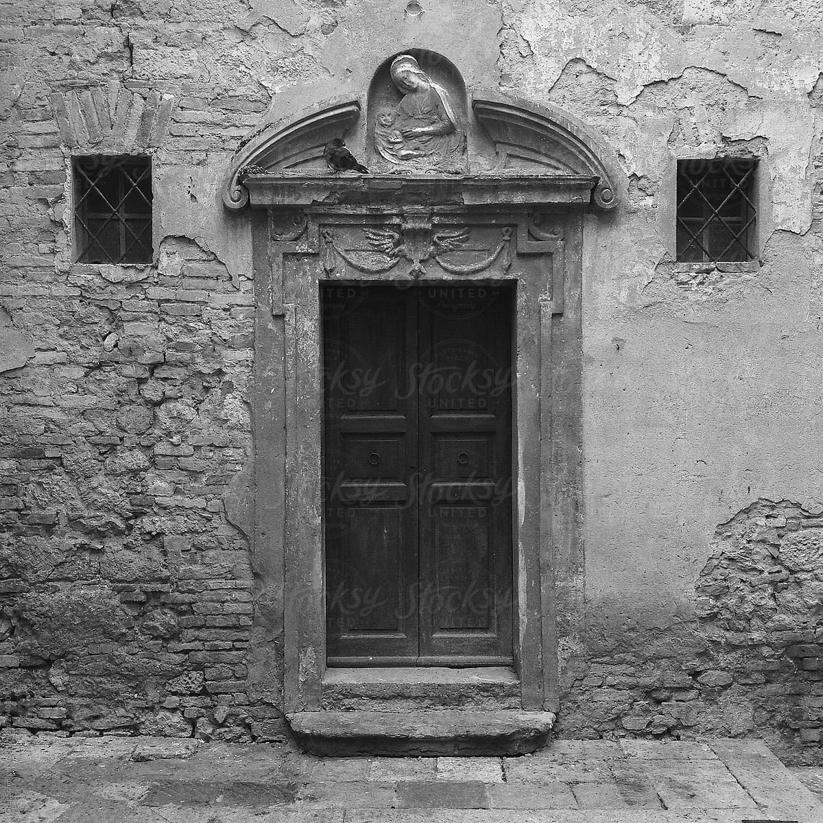Black and white image of village streets in the historic Tuscany village of San Gimignano, Italy